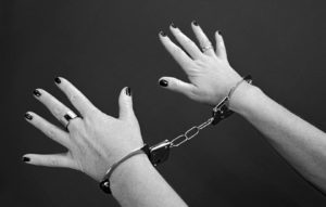 Gratefulpain hands in handcuffs 